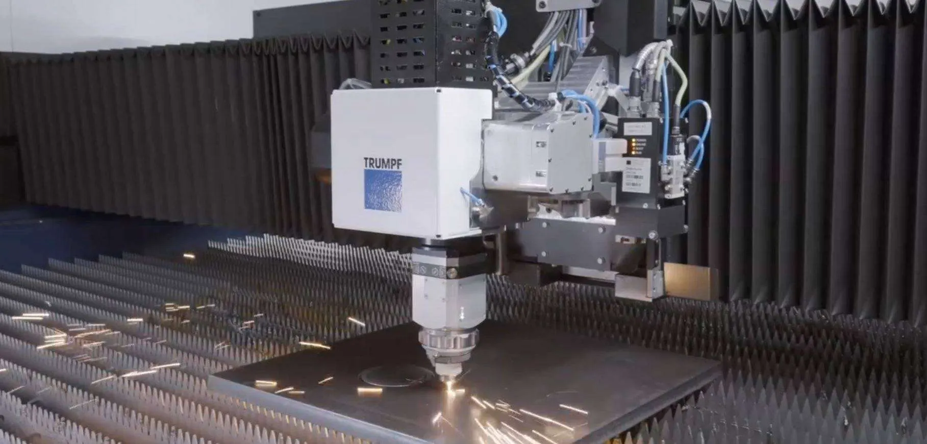 CNC laser cutting machine at Atlant Industries facility